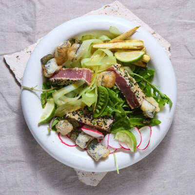 Sesame crusted seared tuna in an  Asian dressing 